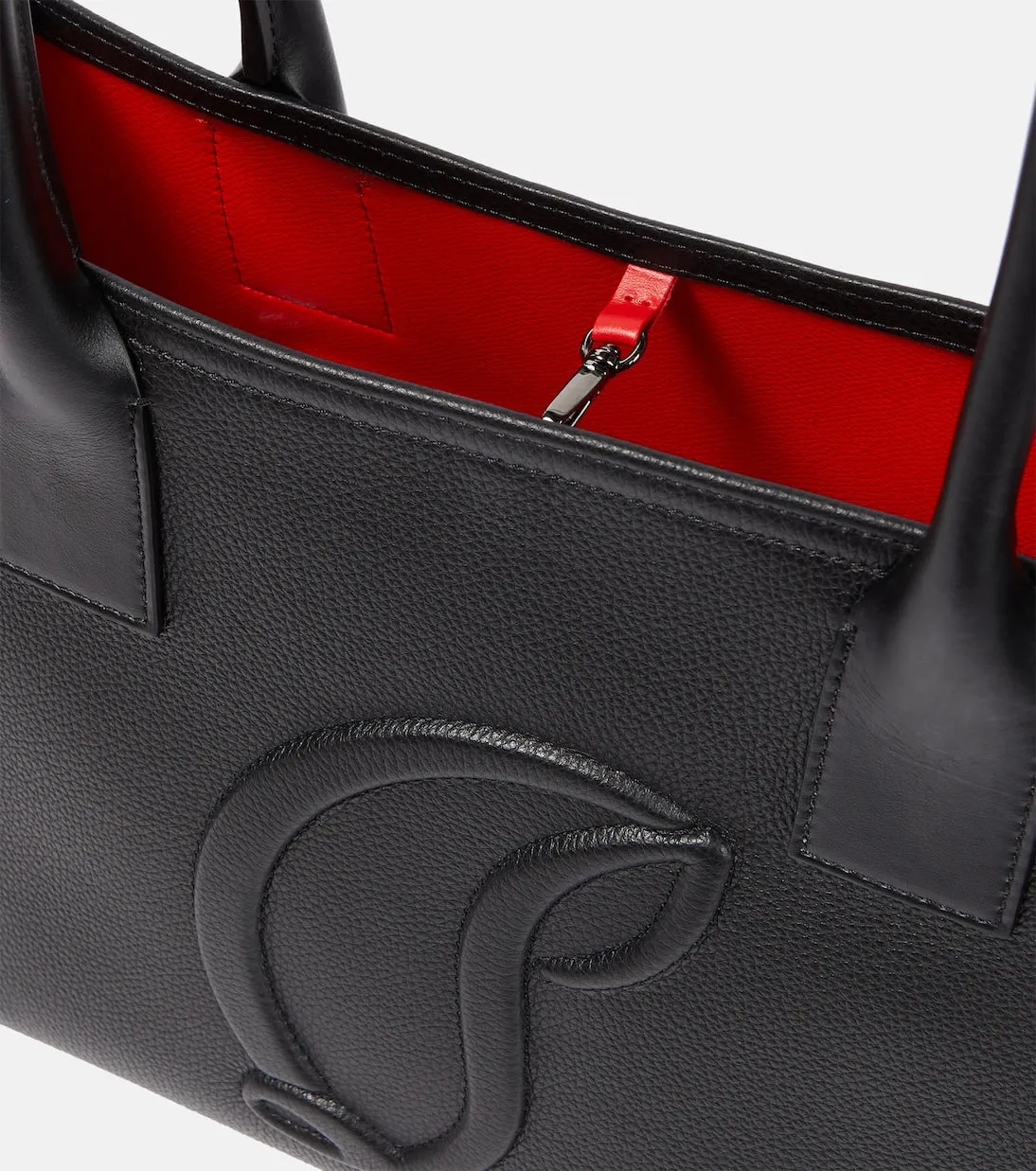 Next to me is a large Christian Louboutin leather tote bag, black.